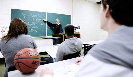 The Professor and the students inside the classroom