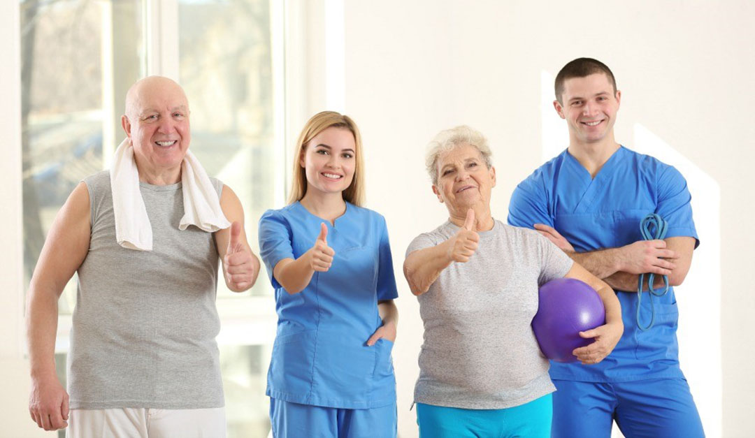 senior and nurse thumbs up