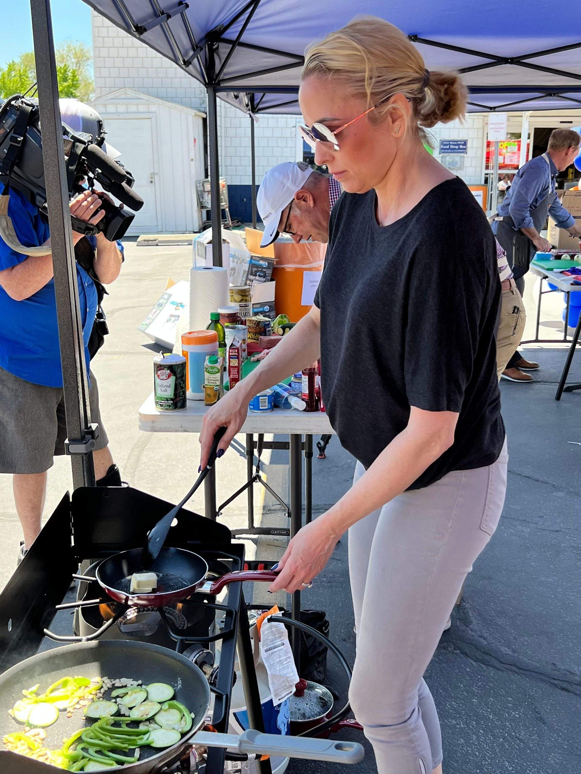 Woman cooking on the tent